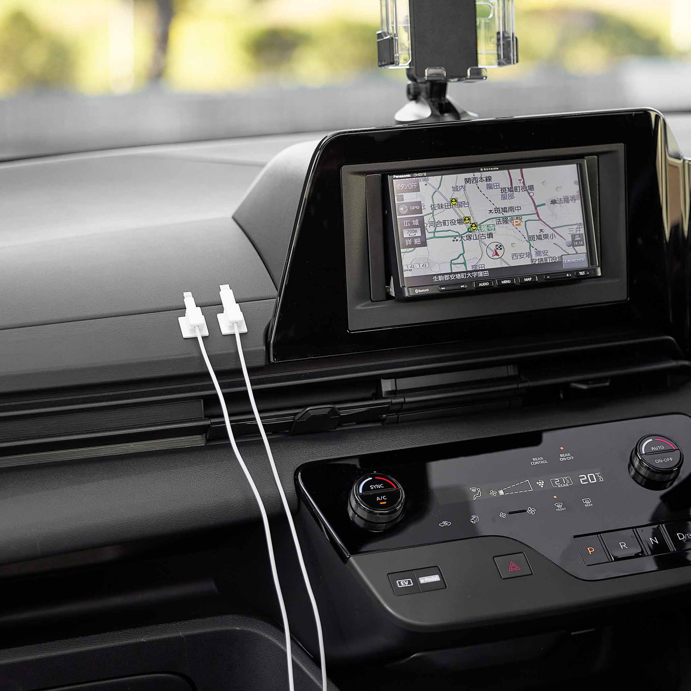 Praktisk kabelholder med base brukt til USB kabel og laderledning