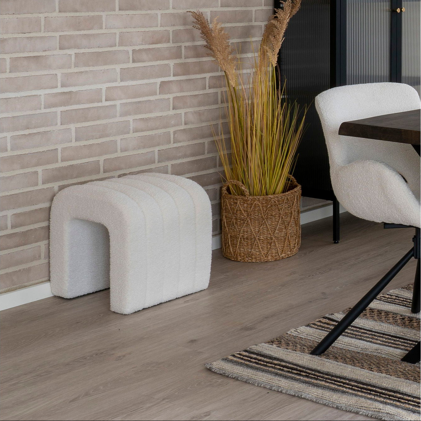 Detaljbilde av boucléstoff på Colma puff