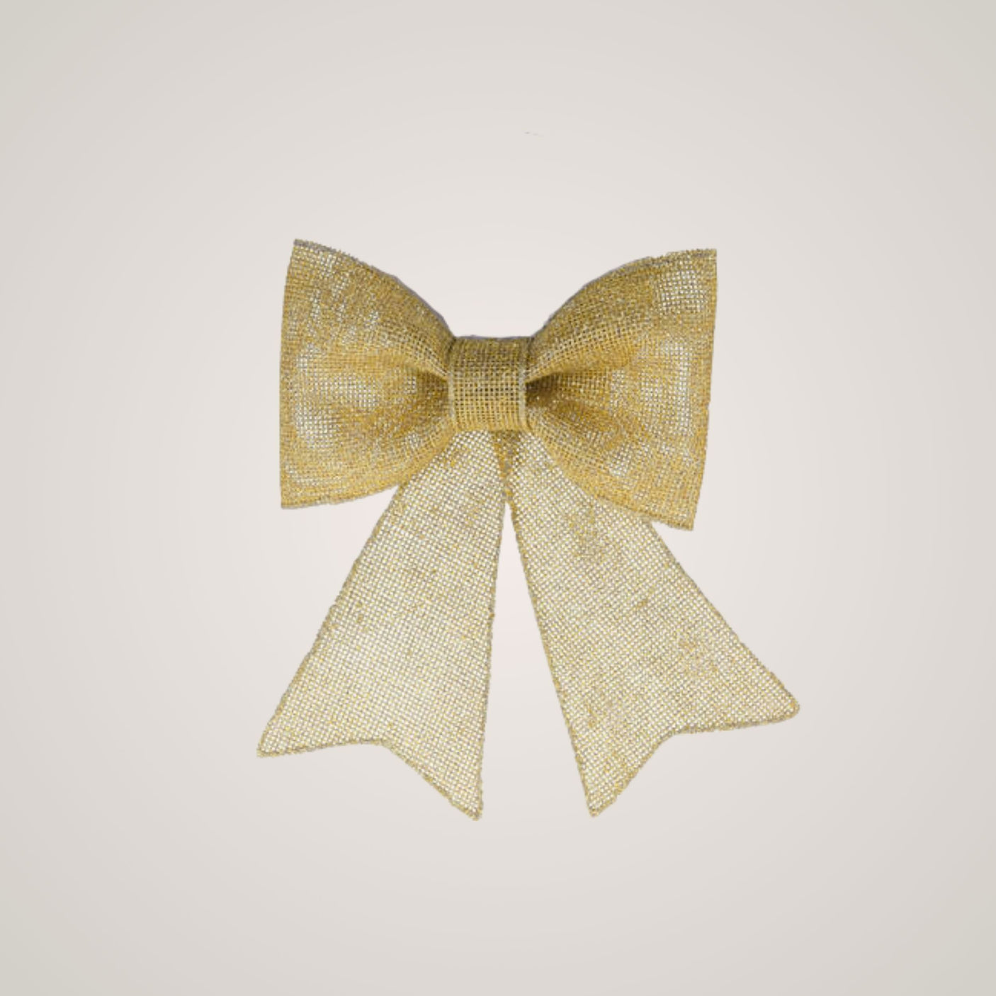 Gullfarget juletresløyfe med glitter, avbildet mot lys bakgrunn.