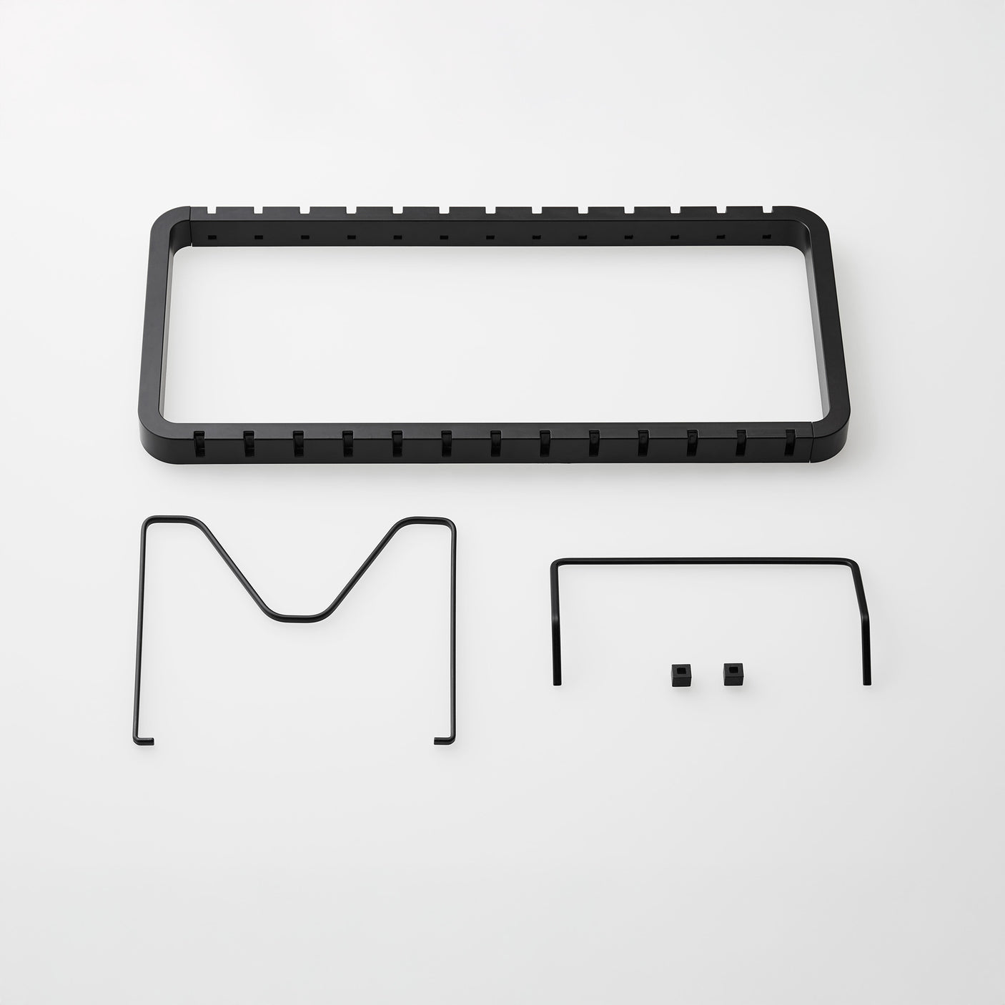 Moderne panneholder med justerbare skillevegger.