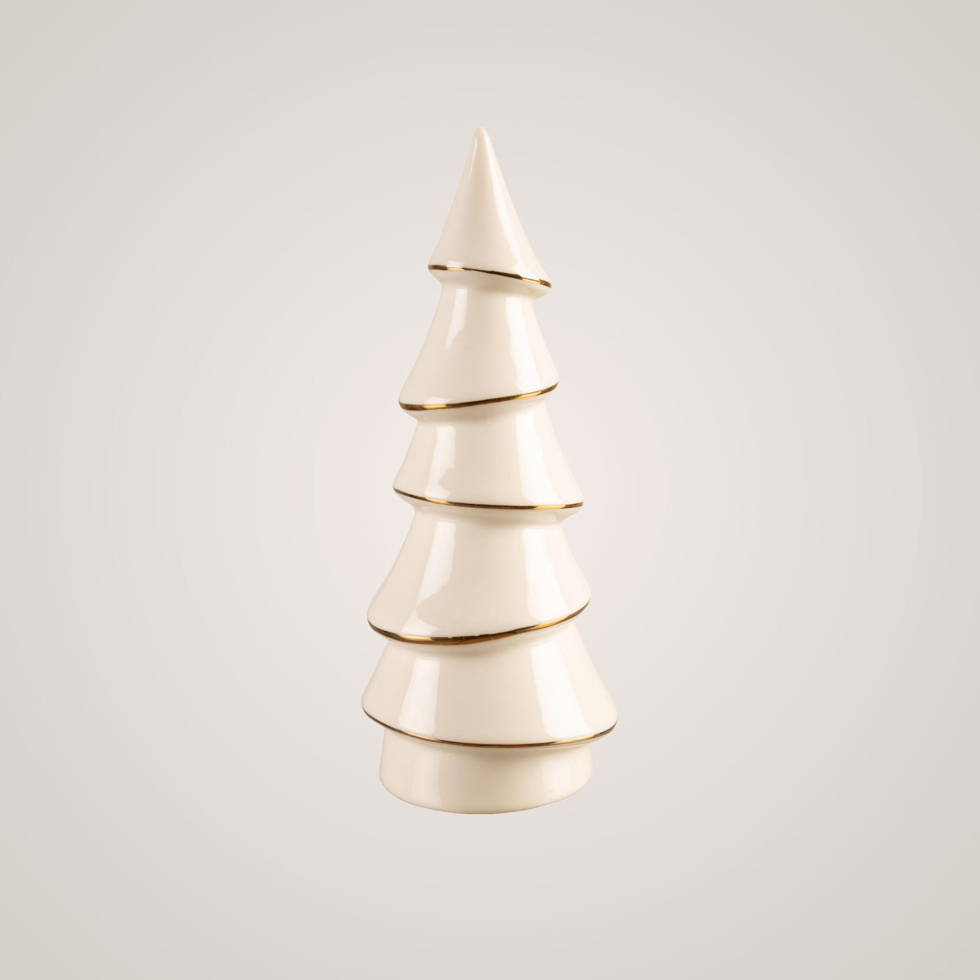 Kremfarget keramikkjuletre med gullkant, 16,3 cm høyt, mot lys bakgrunn.