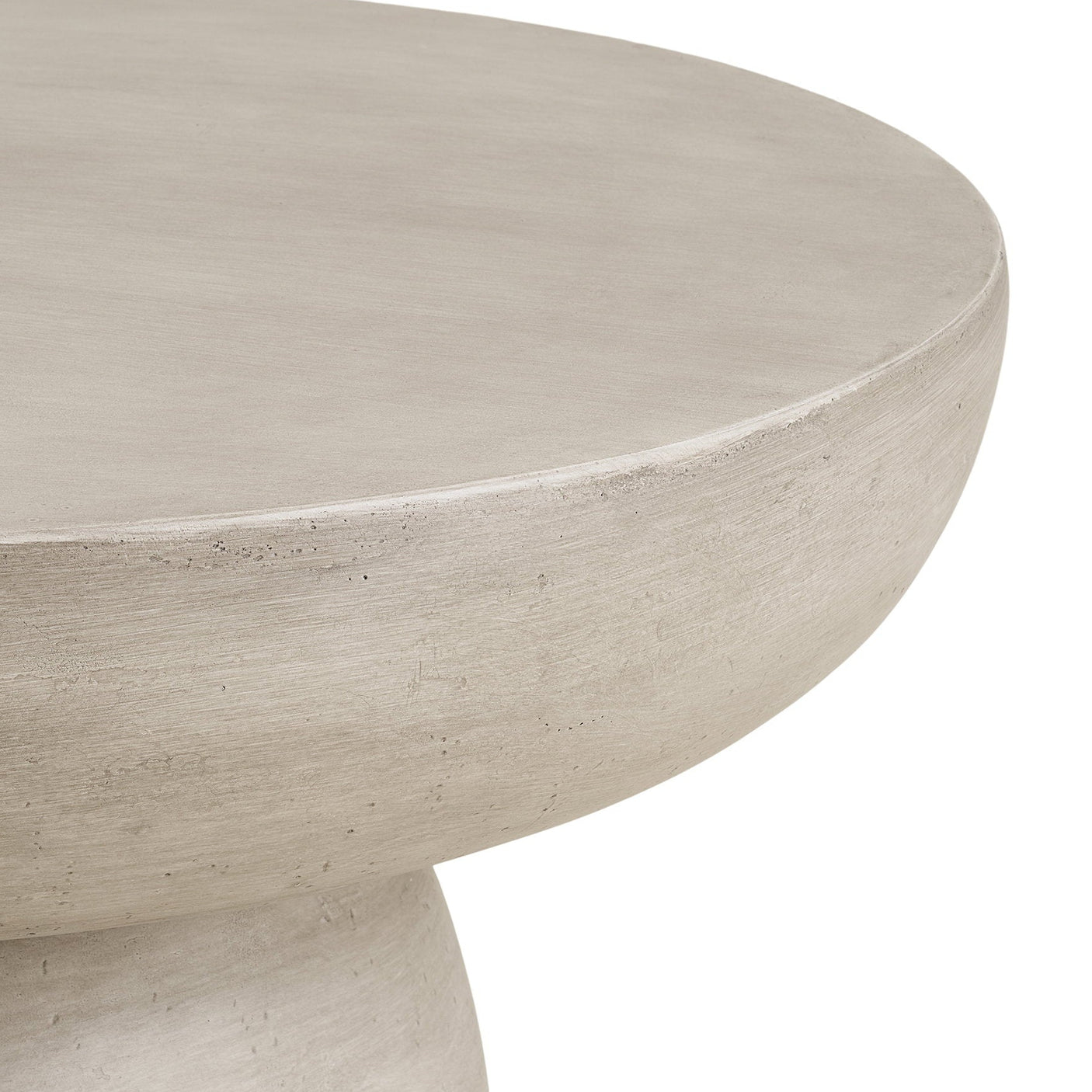 Rundt sofabord med skulpturell base i grå finish til stue og lounge