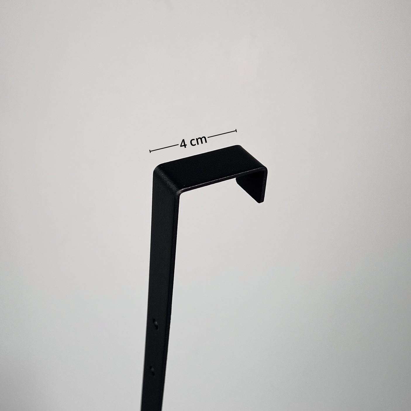 Dusjhylle, sort metall