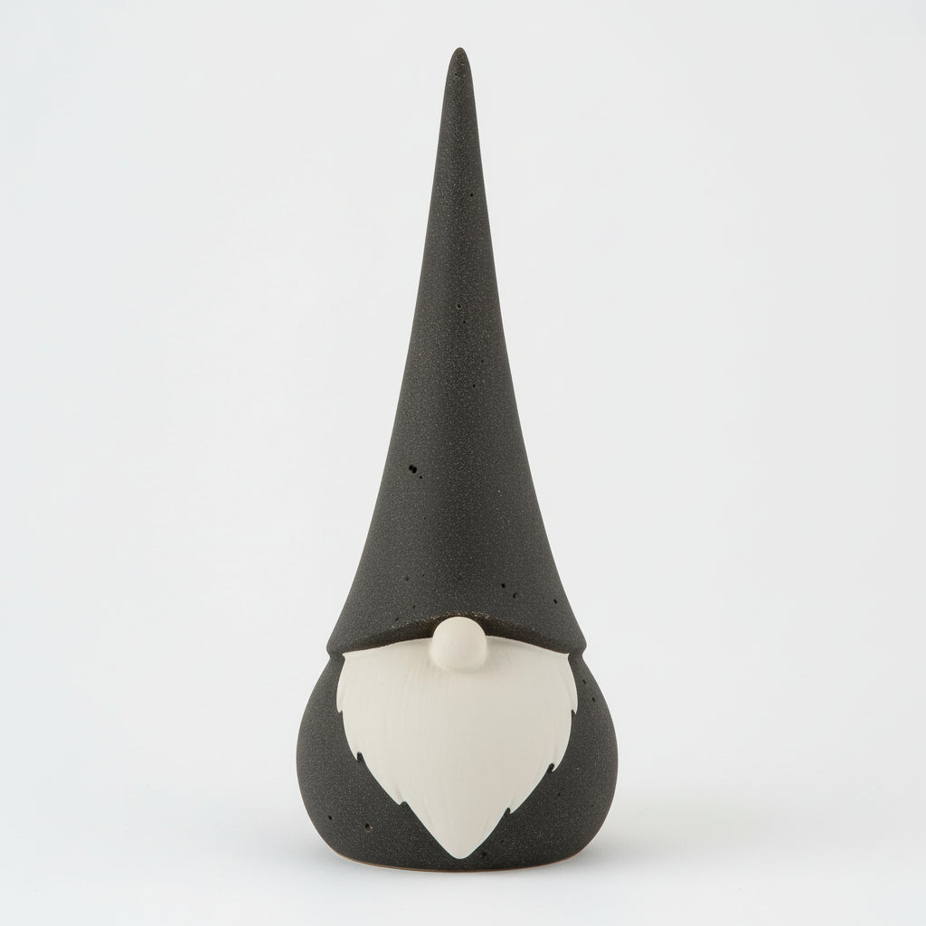 Sort keramikknisse med hvit detalj