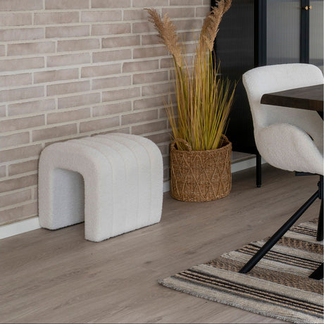 Detaljbilde av boucléstoff på Colma puff