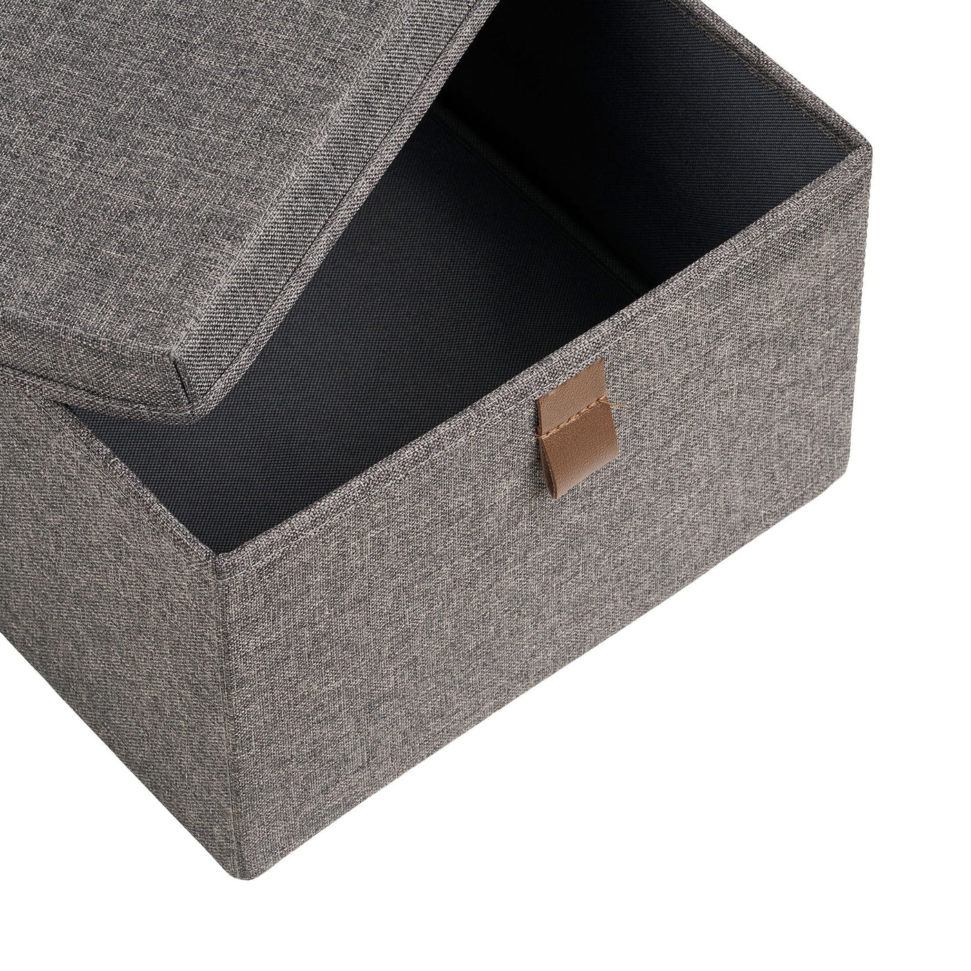 Noto tekstilboks med lokk åpnet