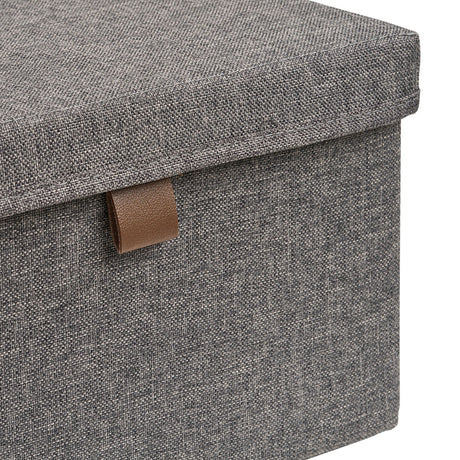 Nærbilde av lokk og PU-håndtak