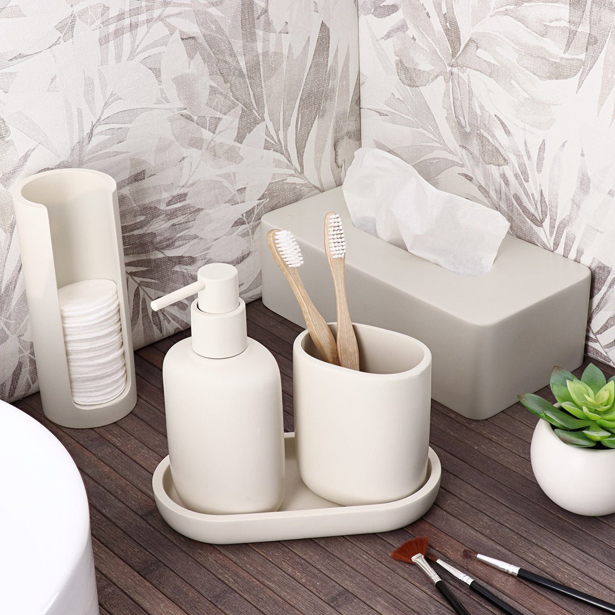 Smal beige dispenser til bomuldspads set fra siden