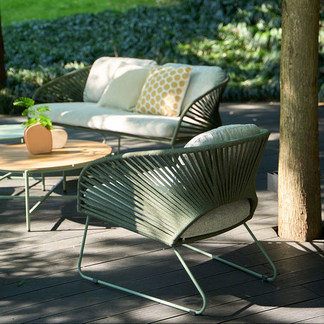 Novella loungesett i grønn og grå fargekombinasjon på hvit bakgrunn