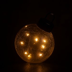 Svart glasskule med varmt LED-lys, produktfoto.