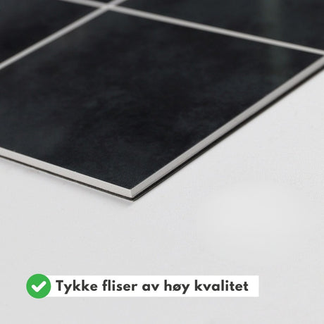 Selvklebende flis i antrasittgrå nyanse for vurdering av farge og tekstur.
