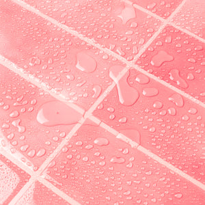 Detaljbilde av vanntette rosa veggfliser med slitesterk overflate, perfekt til kjøkken og vaskerom