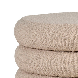 Rund beige puff med skjult oppbevaring og myk bouclétekstur
