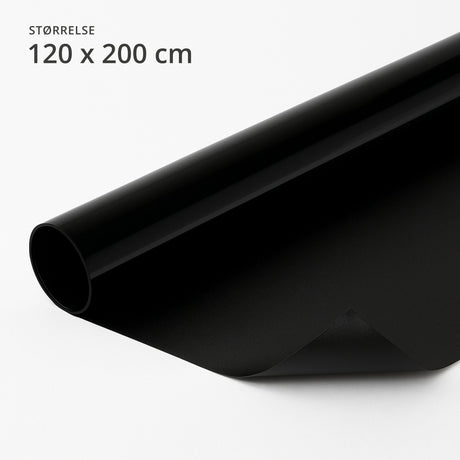 Sort blackout vindusfolie 120 x 200 cm på rull – effektiv solskjerming som blokkerer alt lys og gir mørklegging på soverom, kontor eller TV-rom