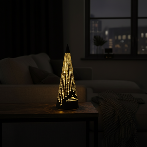 Svart metalllykt med utskårne stjerner og varmt LED-lys