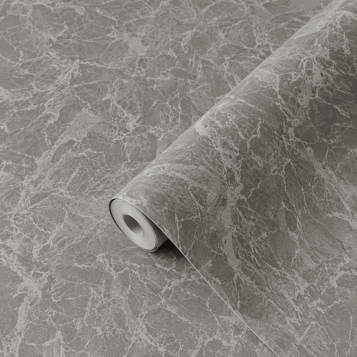 Limestone antrasitt kontaktplast delvis utrullet, detalj av matt mørkgrå steinstruktur