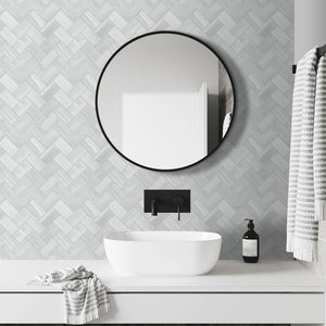 Detaljbilde av Vilde veggfliser med elegant fiskebensmønster