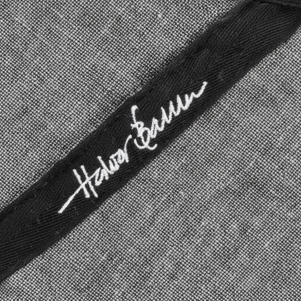 Sorte grytekluter fra Halvor Bakke i melert bomull