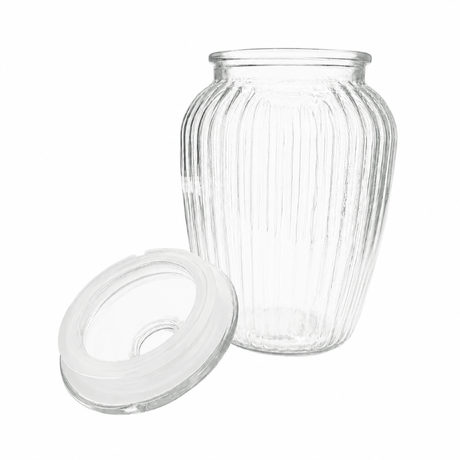 Gjennomsiktig, riflet glasskrukke med avtakbart glasslokk og hvit tetningsring, vist åpen på hvit bakgrunn.