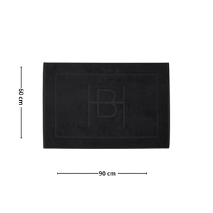 Målbilde av Clifton baderomsmatte i sort som viser formatet 60 x 90 cm og den enkle, rektangulære utformingen.