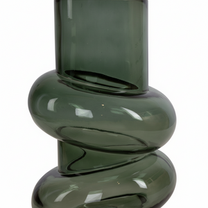 Vase flaskegrønn glass nærbilde stabeldesign fargedybde
