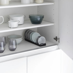 ganizer til tekopper og oppbevaring i kjøkkenskuff.