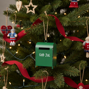Liten julpostkassa till julgranen med nostalgisk uttryck