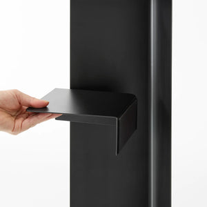 Toalettpapirholder med hjul i svart stål til små bad